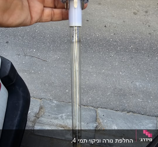 יד מחזיקה גוף חימום חשמלי עם אבנית